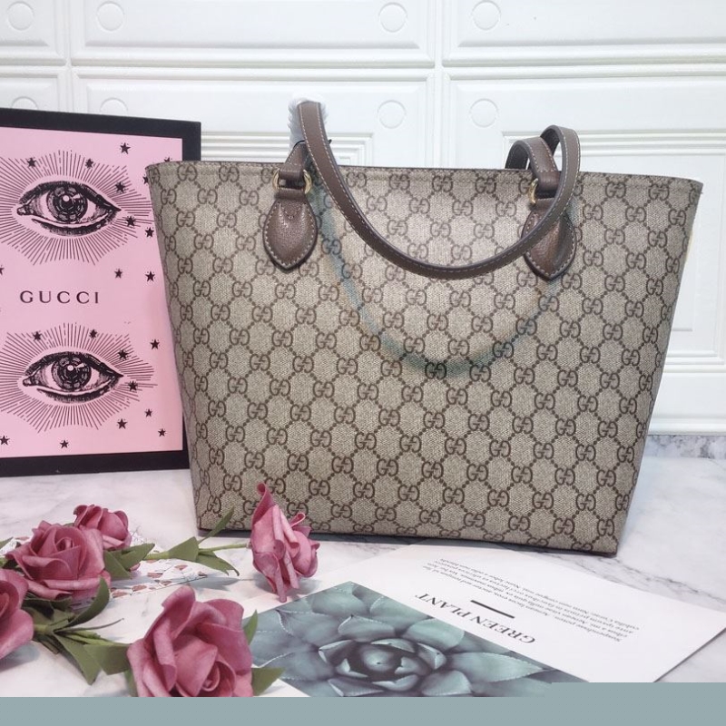 G*u*i shopping bags